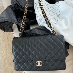 Never carried Chanel black cavier flapbag